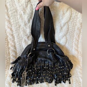 B. Makowsky black bag with fringe